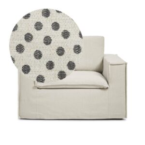 Luca Armchair Dot is a spacious armchair in linen with black dots from MELIMELI